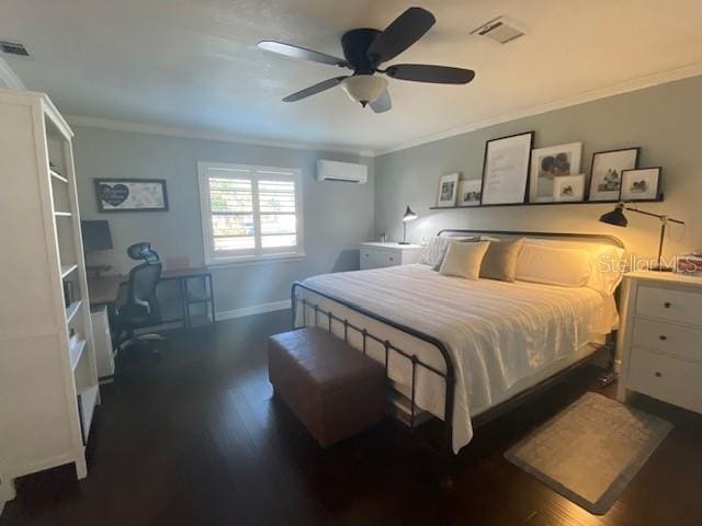 bedroom featuring baseboards, ornamental molding, wood finished floors, and a wall mounted air conditioner