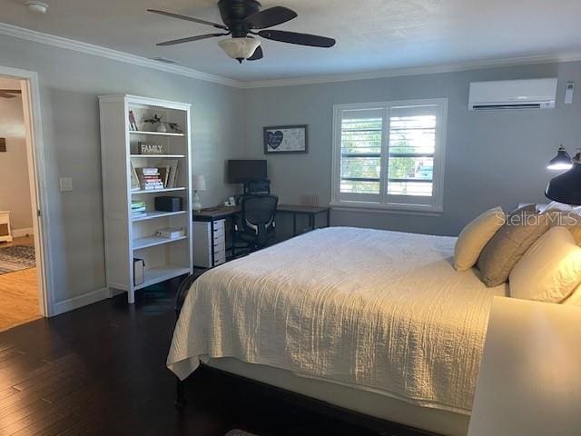 bedroom with dark wood-style floors, baseboards, ornamental molding, and a wall mounted AC