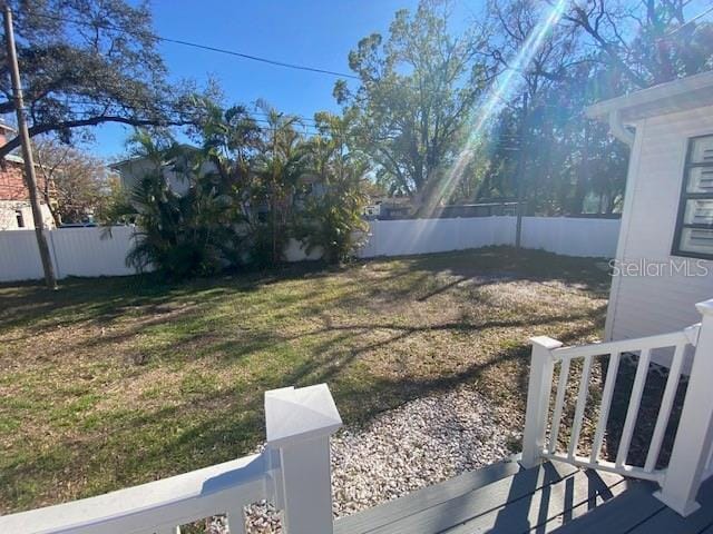 view of yard with a fenced backyard