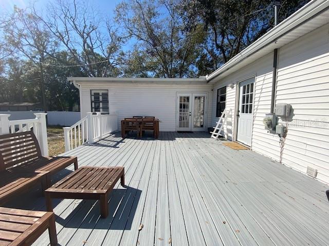 wooden terrace featuring french doors