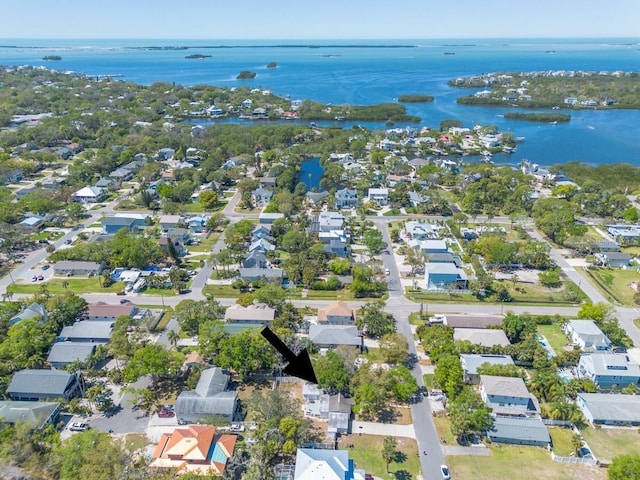 aerial view featuring a water view and a residential view