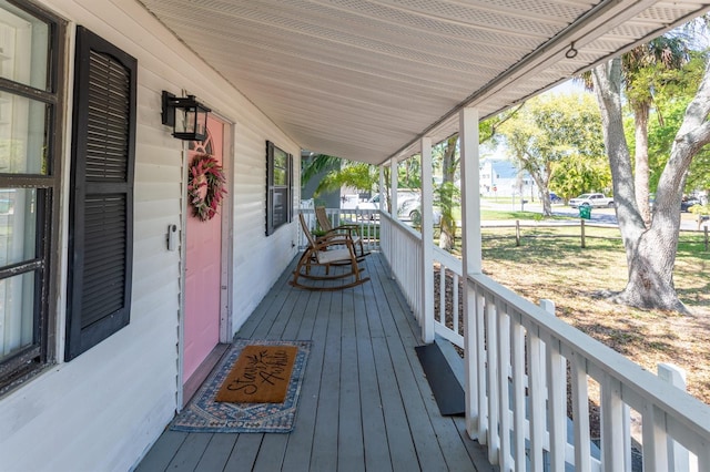 wooden terrace with covered porch