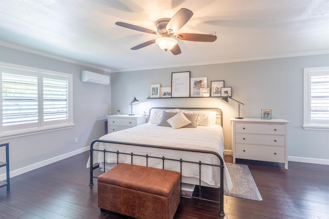 bedroom featuring crown molding, dark wood-style floors, baseboards, and a wall mounted air conditioner