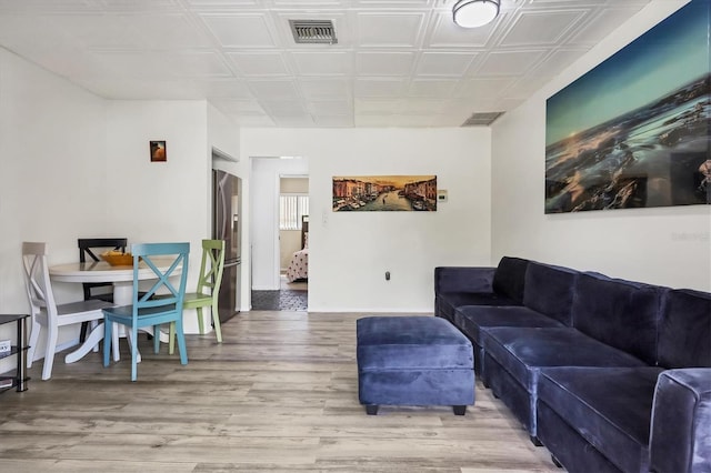 living room with wood-type flooring