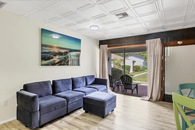 living room with light hardwood / wood-style flooring