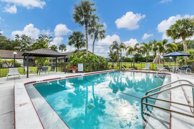 view of pool featuring a gazebo and a patio