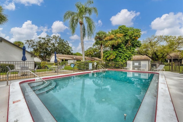 view of pool featuring an outdoor structure