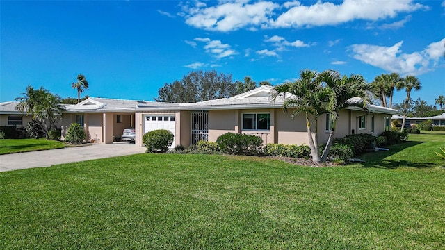 ranch-style home with a garage, concrete driveway, a front yard, and stucco siding