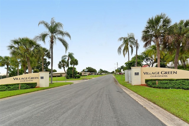 view of street with curbs