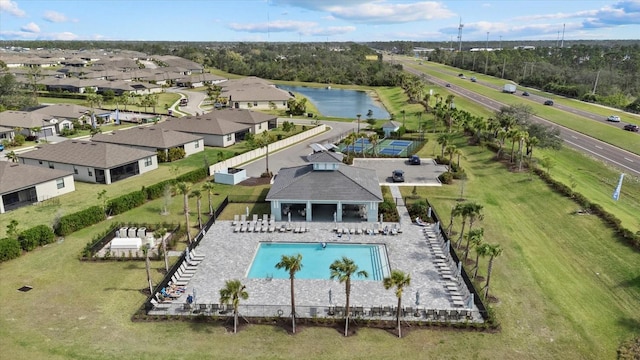 aerial view with a water view and a residential view