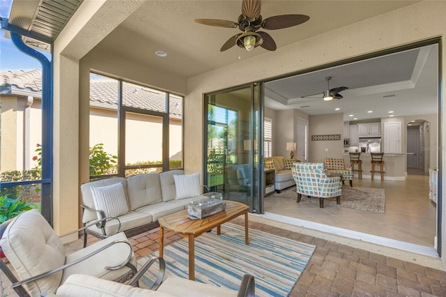 5556 Cantucci St, Nokomis, FL 34275 - sunroom / solarium featuring a ceiling fan, outdoor lounge area, and healthy amount of natural light