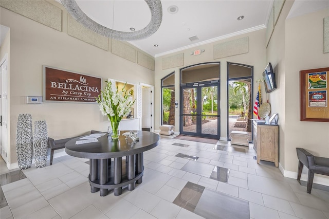 5556 Cantucci St, Nokomis, FL 34275 - common area featuring ornamental molding and a towering ceiling