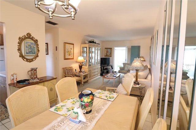 dining room with a notable chandelier