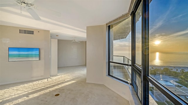 interior space featuring ceiling fan