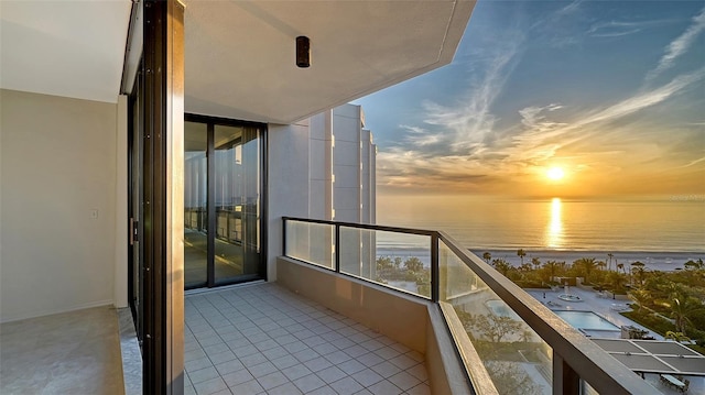 balcony at dusk with a water view