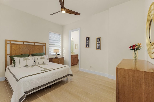 bedroom with connected bathroom, ceiling fan, and light hardwood / wood-style flooring