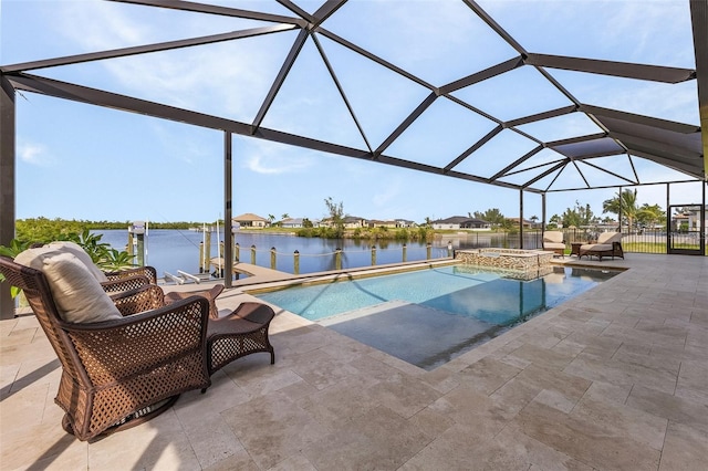 view of pool with an in ground hot tub, a water view, a lanai, and a patio