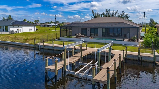 dock area featuring a fenced in pool, a lanai, a lawn, and a water view