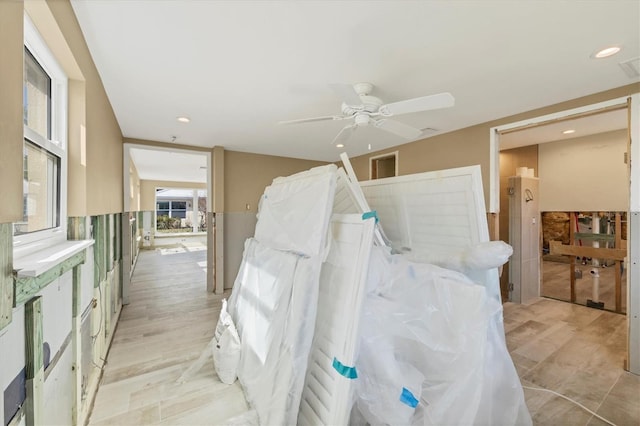 bedroom featuring light hardwood / wood-style floors and ceiling fan