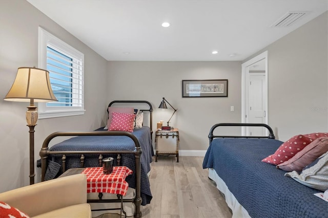 bedroom featuring light hardwood / wood-style flooring