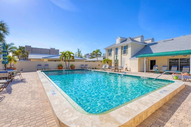 view of swimming pool featuring a patio