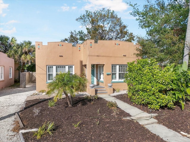 view of adobe home