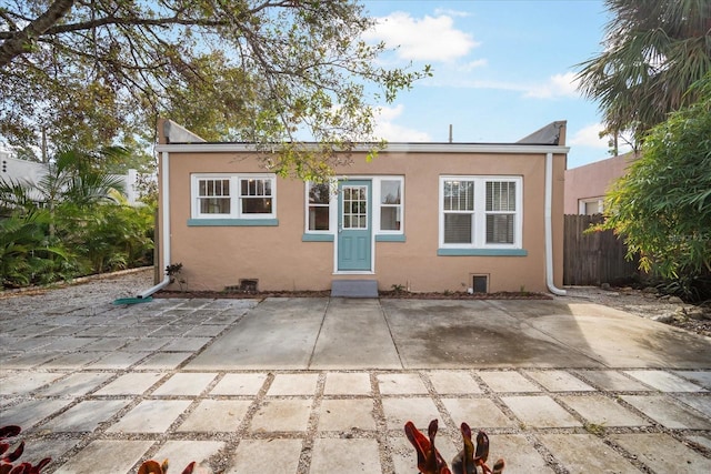 rear view of property featuring a patio