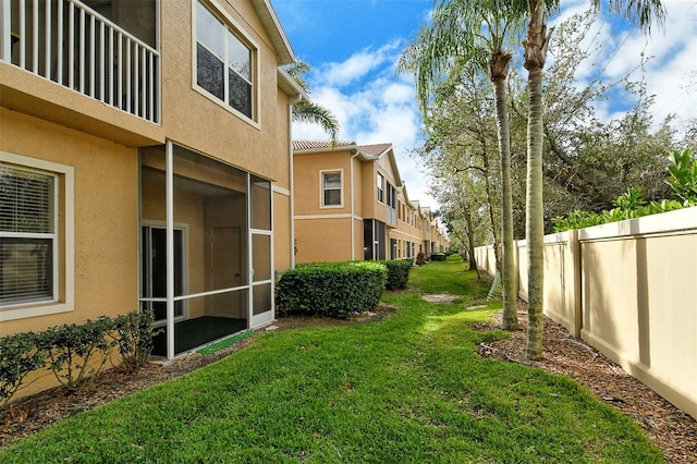 view of yard featuring a residential view and fence