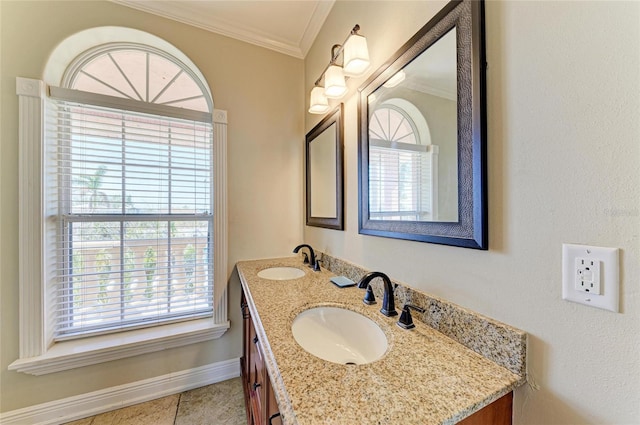 bathroom featuring ornamental molding and vanity