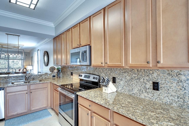 kitchen featuring appliances with stainless steel finishes, sink, decorative backsplash, light stone counters, and crown molding