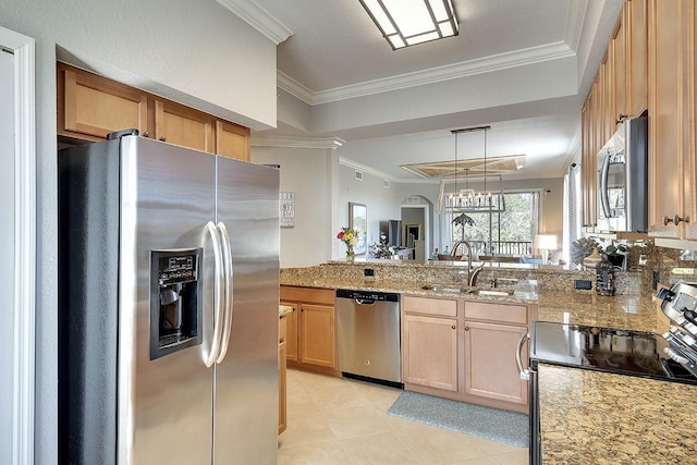 kitchen with sink, appliances with stainless steel finishes, ornamental molding, light brown cabinetry, and kitchen peninsula