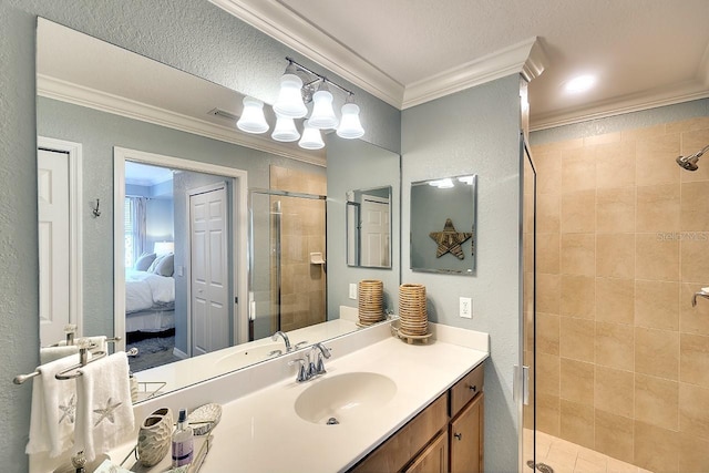 bathroom with crown molding, vanity, a textured ceiling, and walk in shower