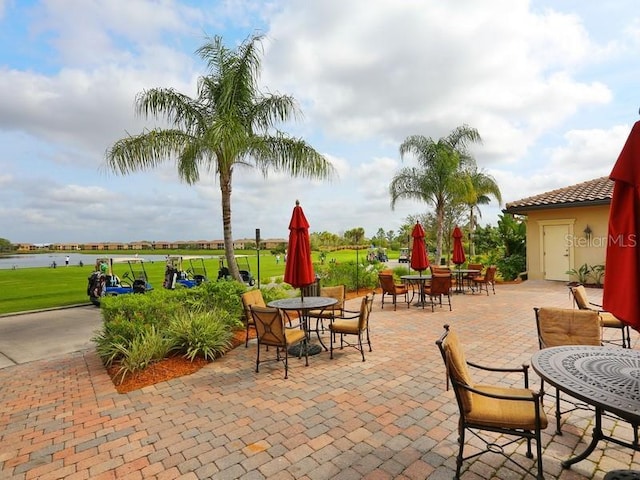 view of patio / terrace with a water view