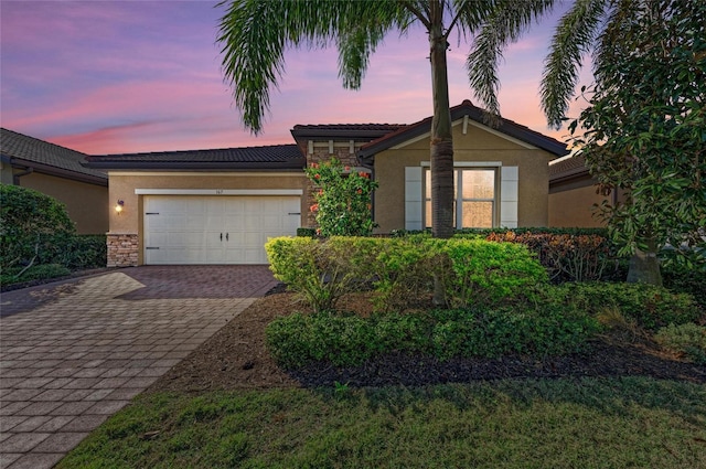 view of front of house with a garage