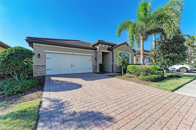 view of front of home featuring a garage