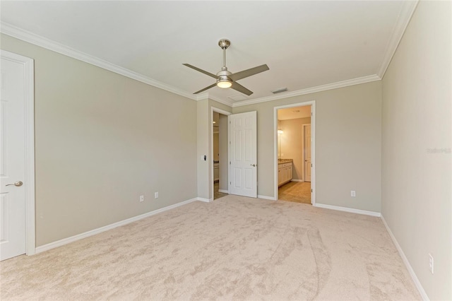 unfurnished bedroom featuring ceiling fan, ornamental molding, connected bathroom, and light carpet