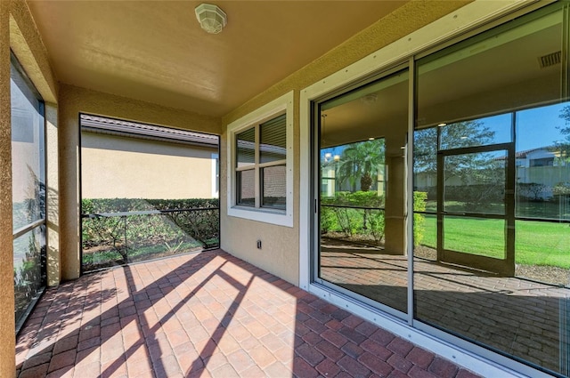 view of unfurnished sunroom