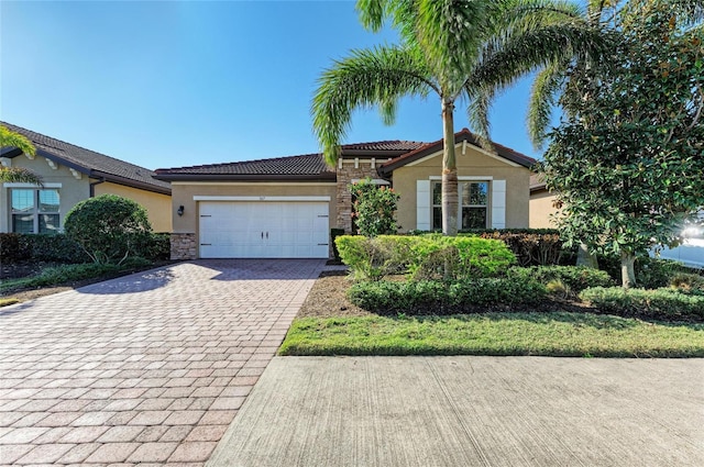 view of front of property featuring a garage