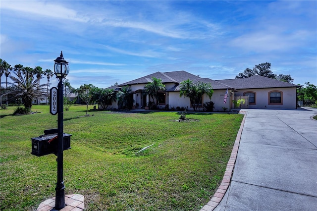 view of front of home with a front lawn