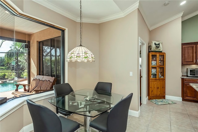 tiled dining area with crown molding