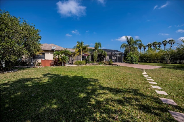 2002 Palm View Rd, Sarasota, FL 34240 - view of green lawn featuring a lanai