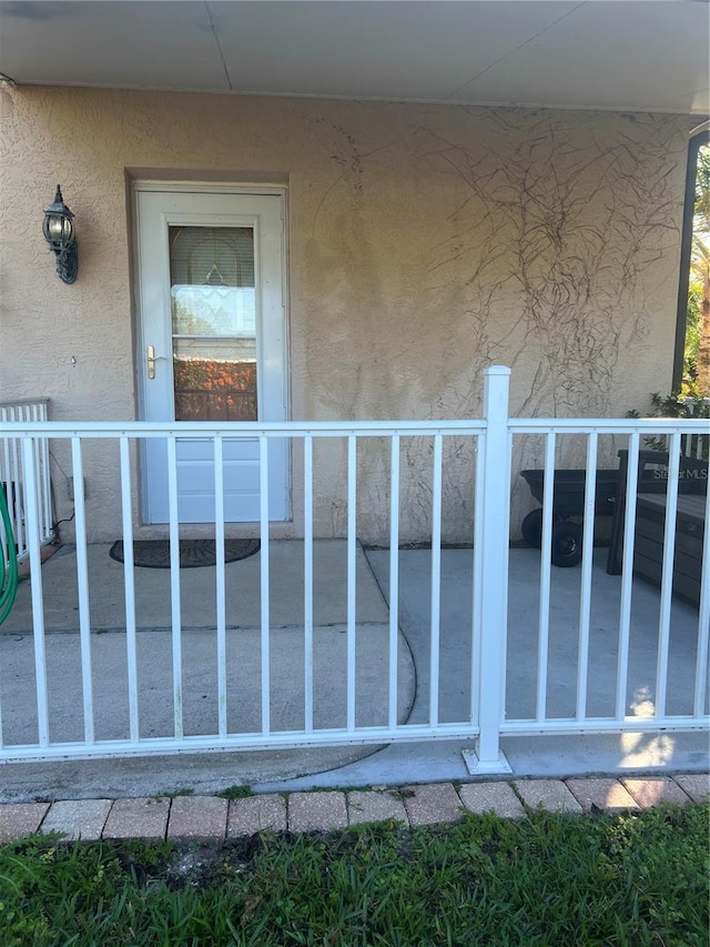 2002 Palm View Rd, Sarasota, FL 34240 - property entrance featuring stucco siding