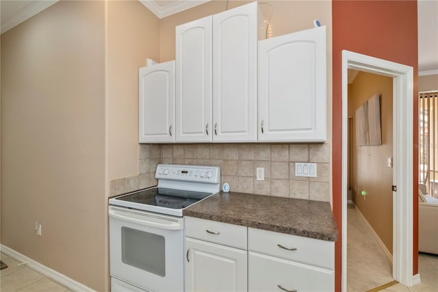 2002 Palm View Rd, Sarasota, FL 34240 - kitchen featuring white range with electric cooktop, dark countertops, white cabinets, and ornamental molding