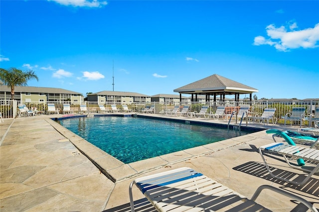 view of pool with a gazebo and a patio