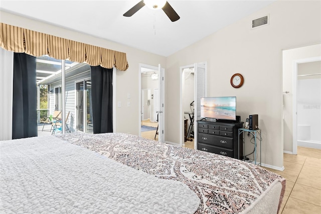 tiled bedroom with access to exterior and ceiling fan