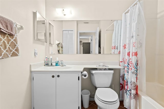 full bathroom with vanity, toilet, and shower / bath combo with shower curtain