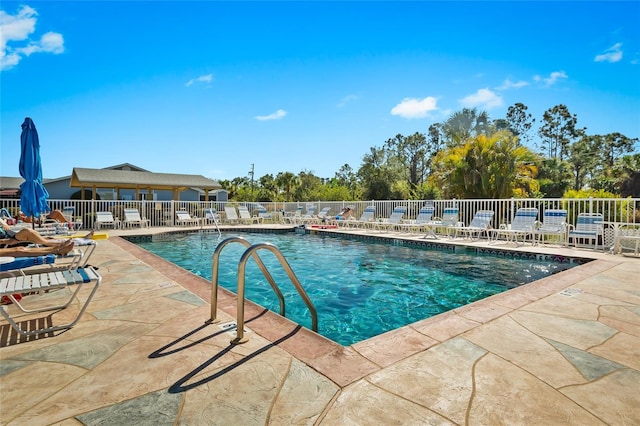 view of pool featuring a patio area