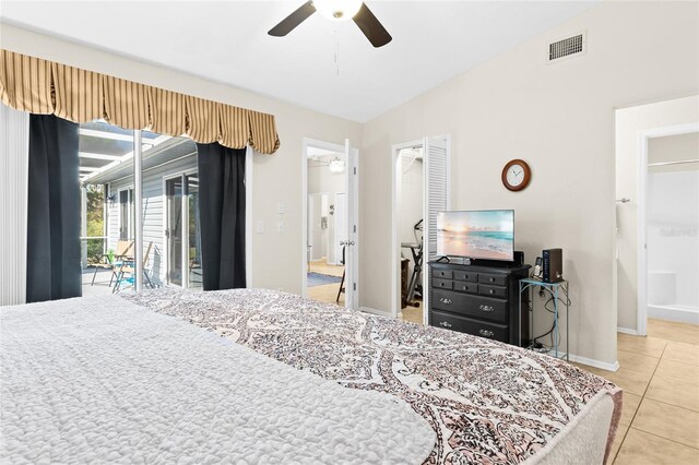 3300 Loveland Blvd Unit 3203, Punta Gorda, FL 33980 - bedroom featuring tile patterned floors, access to exterior, and a ceiling fan