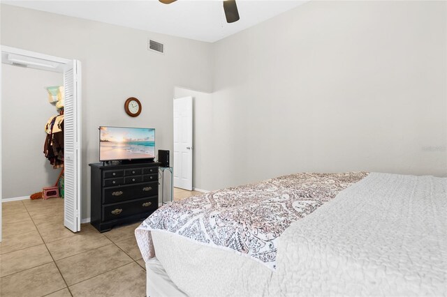3300 Loveland Blvd Unit 3203, Punta Gorda, FL 33980 - bedroom with a closet, light tile patterned flooring, a spacious closet, and ceiling fan