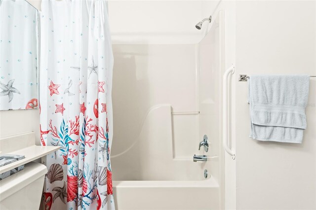 3300 Loveland Blvd Unit 3203, Punta Gorda, FL 33980 - bathroom with shower / bath combination with curtain and toilet